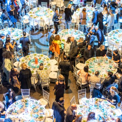 Caproate dinner event utilizing round tables